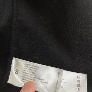 Side small black British blazer